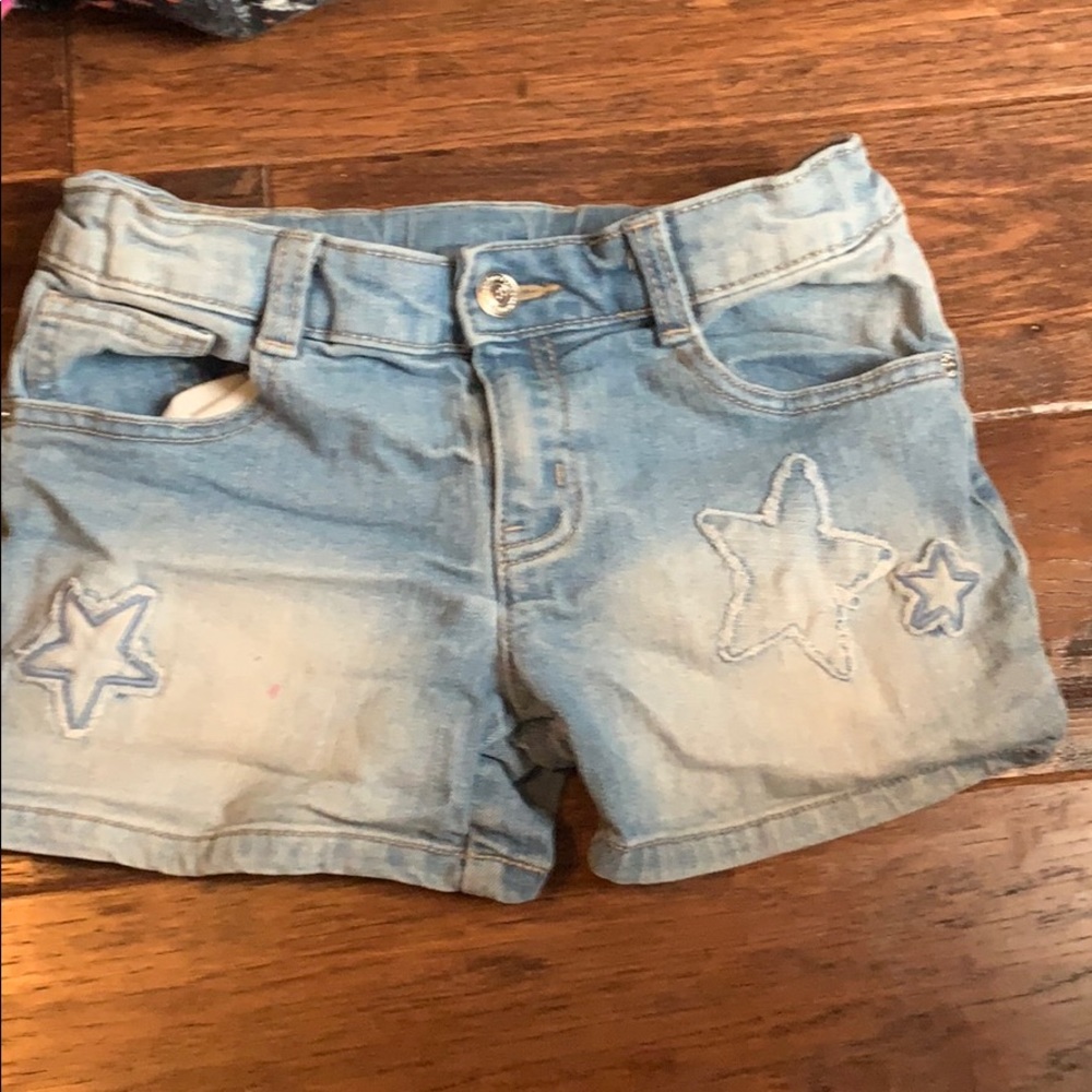 They are a pair of blue denim shorts( size 12)